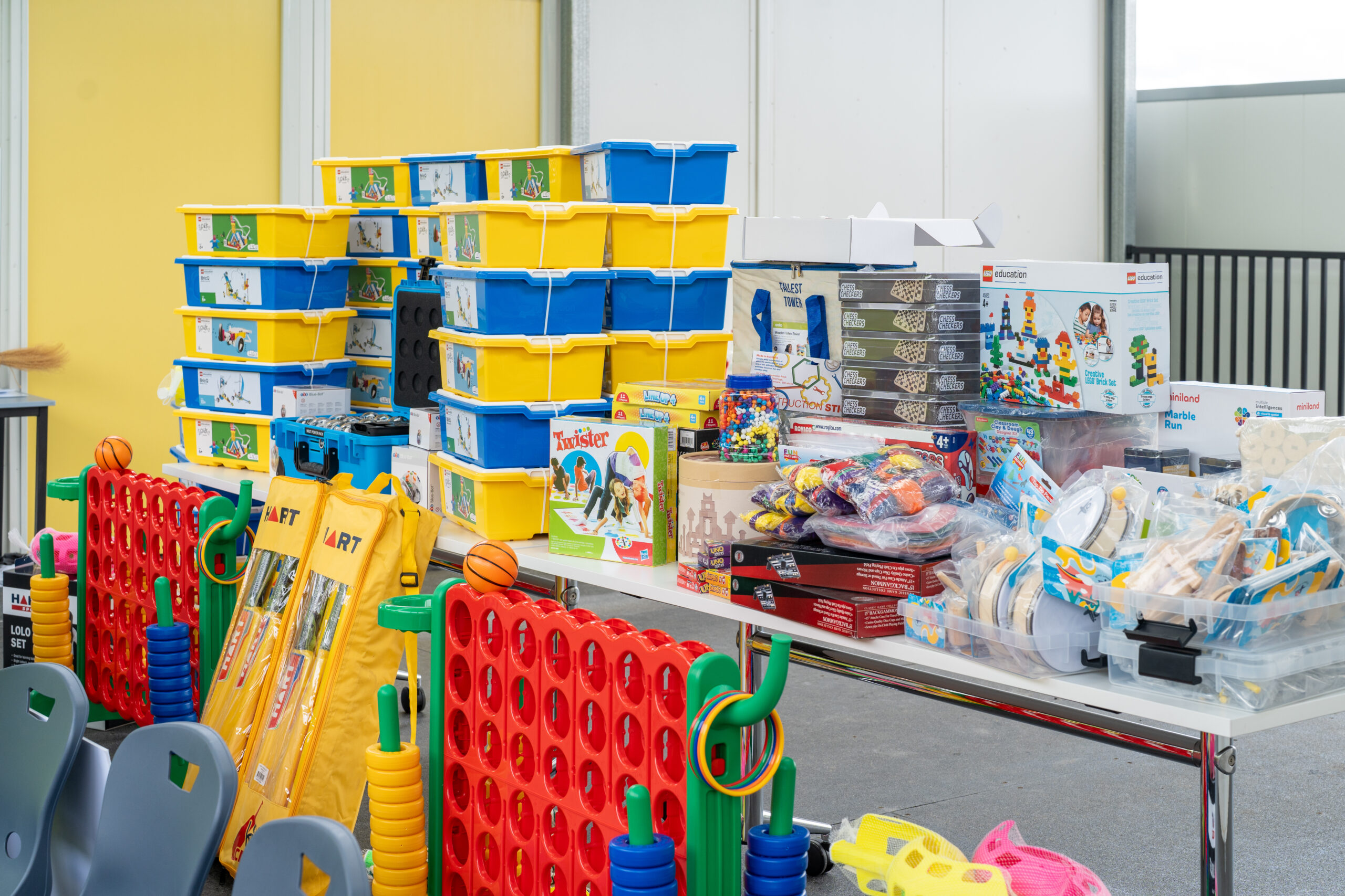 An array of new books, sporting equipment, and learning resources